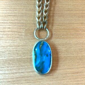 Sterling silver chain and turquoise pendant